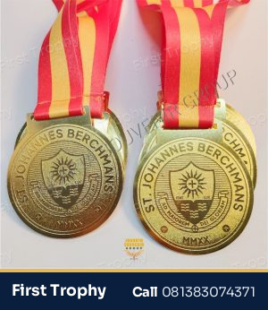 Medali Kuningan Champion